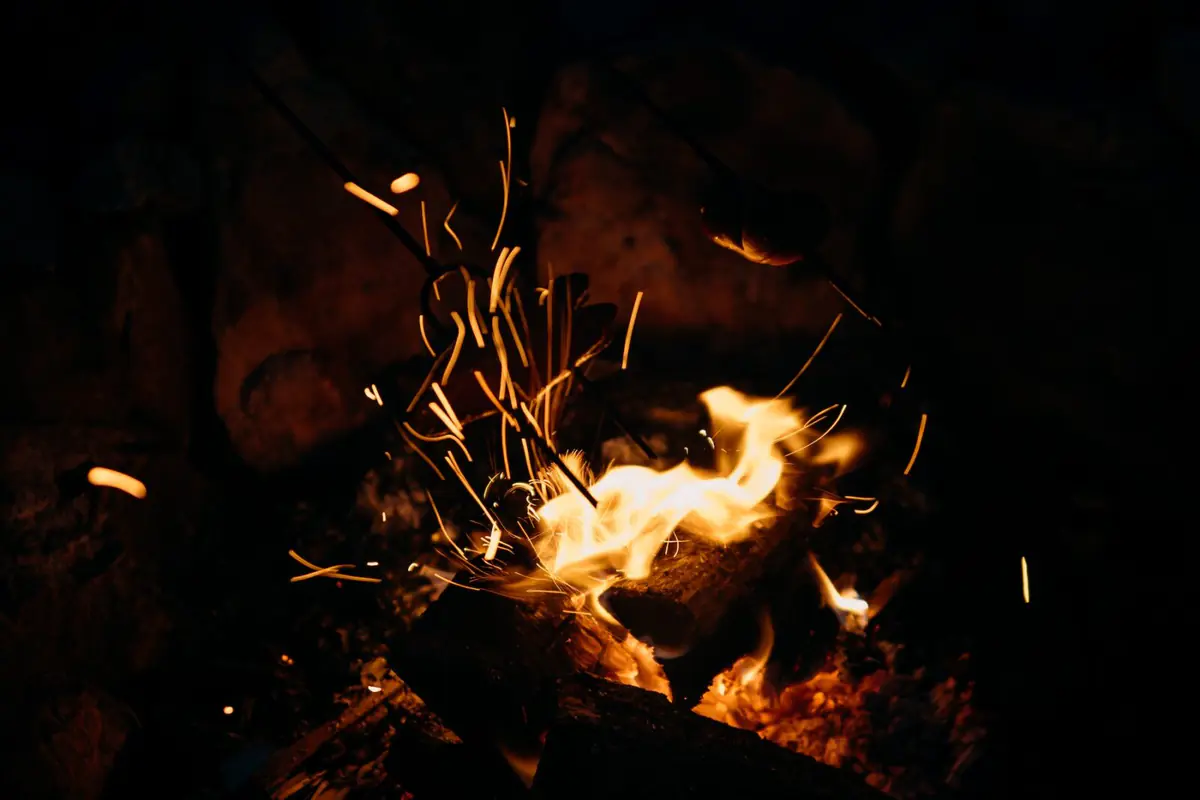 A crackling fire in the fire pit