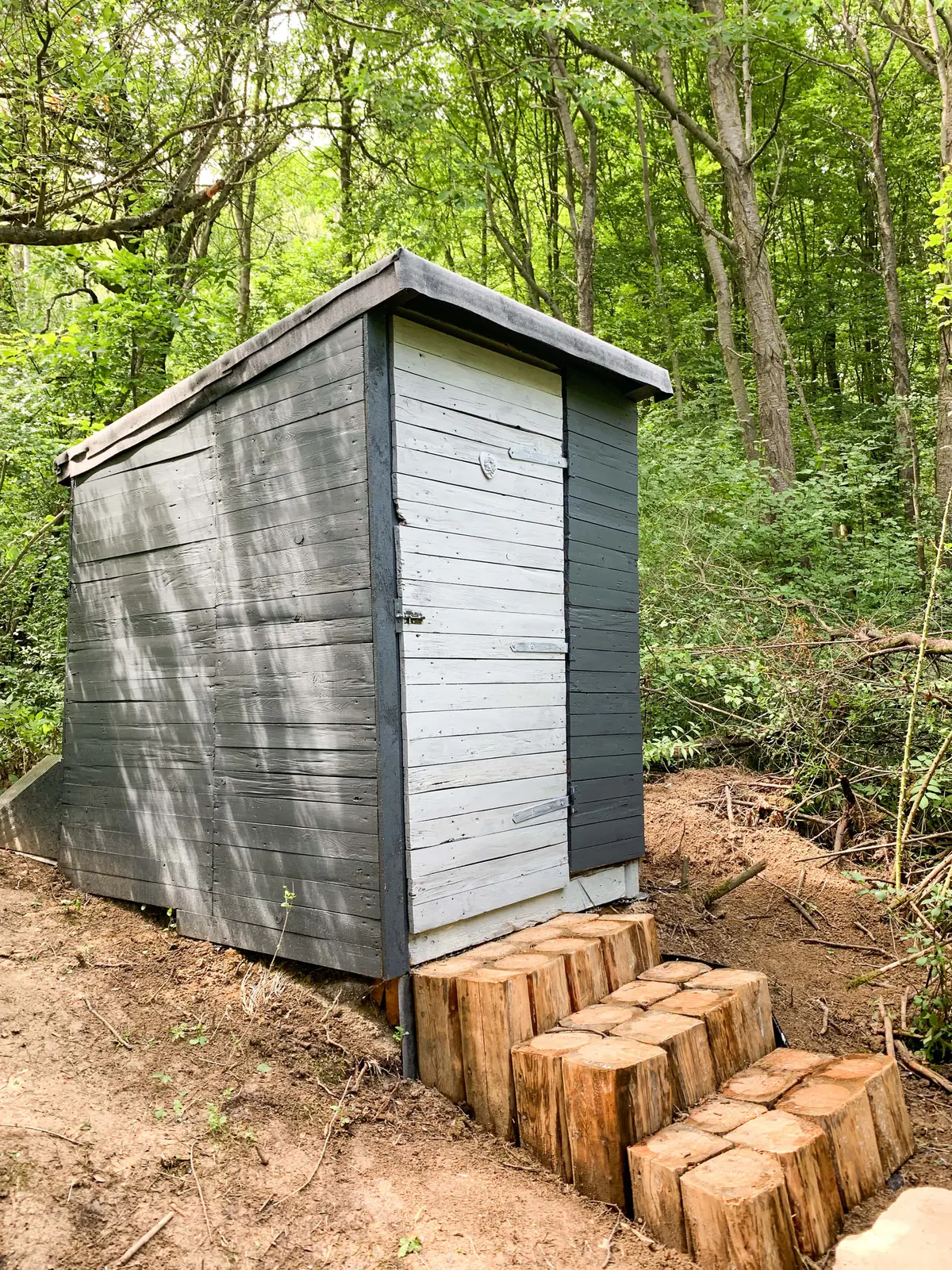 Wooden dry toilet by the glamping
